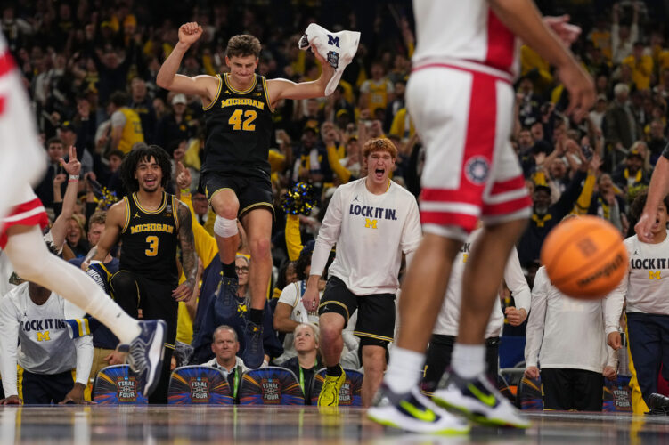 Michigan overpowers Arizona and reaches national title game with 91-73 win